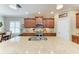 Spacious kitchen with granite countertops, stainless steel appliances, and ample cabinetry at 12343 Halfmoon Lake Ter, Bradenton, FL 34211