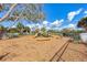 Community playground with slides, benches, and climbing structures on a wood chip surface at 12343 Halfmoon Lake Ter, Bradenton, FL 34211