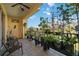 Relax on this covered balcony with outdoor ceiling fan and a view of the water at 1308 3Rd Street E Cir, Palmetto, FL 34221