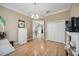 Spacious living room with a view of the entryway, stairs and closet at 1308 3Rd Street E Cir, Palmetto, FL 34221