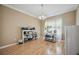 Bright room with light wood floors, crown moulding, and a view to the outside at 1308 3Rd Street E Cir, Palmetto, FL 34221