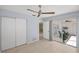 This room offers an airy feel with a sliding glass door and a view of the outside patio at 1565 Saturn Rd, Venice, FL 34293