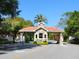 Community entrance with a sign and well-maintained landscaping at 1718 Starling Dr # 104, Sarasota, FL 34231