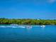 Enjoy water sports on the open water with boats and jet skis, highlighting the recreational opportunities at 1718 Starling Dr # 104, Sarasota, FL 34231