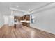 Bright kitchen featuring a center island, stainless steel appliances, and wood cabinets at 18821 Dayspring Pl, Venice, FL 34293