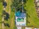 Aerial view highlighting a well-maintained pool area with ample lounge chairs and a gazebo at 2320 Terra Ceia Bay Blvd # 406, Palmetto, FL 34221