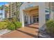 Inviting building entrance with well-maintained landscaping and clear signage at complex at 2320 Terra Ceia Bay Blvd # 406, Palmetto, FL 34221