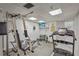 Fully equipped exercise room with treadmill, multi-gym, and free weights at 2320 Terra Ceia Bay Blvd # 406, Palmetto, FL 34221