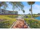 Scenic view of Terra Ceia Club Condo grounds with walking paths, water features, and a bridge to a gazebo at 2320 Terra Ceia Bay Blvd # 406, Palmetto, FL 34221