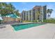 Resort-style swimming pool with a gazebo and lounge chairs perfect for relaxing poolside at 2320 Terra Ceia Bay Blvd # 406, Palmetto, FL 34221