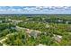 A residential area offers a peaceful, tree-filled landscape, perfect for those seeking serenity and nature at 2625 Yuma Ave, North Port, FL 34286