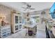 A creative craft room with organized storage, natural light, and a functional workspace at 2625 Yuma Ave, North Port, FL 34286