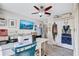 Bright and airy craft room with sewing station, tv, and organized storage solutions at 2625 Yuma Ave, North Port, FL 34286