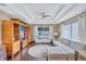 Inviting living room with coffered ceiling, abundant natural light, and comfortable seating at 2625 Yuma Ave, North Port, FL 34286