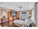 Comfortable living room features a coffered ceiling, hardwood floors, and an entertainment center at 2625 Yuma Ave, North Port, FL 34286