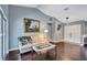Inviting living room features high ceilings, hardwood floors, and contemporary decor at 2625 Yuma Ave, North Port, FL 34286