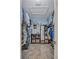 A well-organized walk-in closet featuring ample storage solutions and a stylish full-length mirror at 2625 Yuma Ave, North Port, FL 34286
