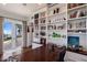 Office with built-in bookshelves and a view of the water at 2828 Riverview Blvd, Bradenton, FL 34205
