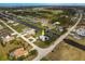 Aerial view of a waterfront home situated on a corner lot and located on a canal at 292 Long Meadow Ln, Rotonda West, FL 33947