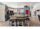 Open kitchen with granite countertops, stainless steel appliances, wine rack and a cozy breakfast bar with seating at 292 Long Meadow Ln, Rotonda West, FL 33947