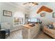 Office featuring a spacious desk, modern computer setup, and comfortable armchair at 292 Long Meadow Ln, Rotonda West, FL 33947
