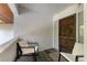 Cozy front patio with seating, offering a relaxing outdoor space at 3330 Thornwood Rd # 3330, Sarasota, FL 34231
