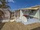 Rear exterior view of home featuring a private, fenced patio area and outdoor grilling space at 4103 12Th Street E Ct, Ellenton, FL 34222