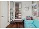 Relaxing Florida room with white walls and a view of the home's interior at 4103 12Th Street E Ct, Ellenton, FL 34222