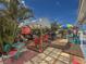 Charming patio area with vibrant decor, comfortable seating, and a relaxing outdoor ambiance at 4103 12Th Street E Ct, Ellenton, FL 34222