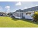 Exterior view of a residential building featuring a green yard at 4104 35Th W Ave, Bradenton, FL 34205