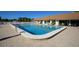 Community pool featuring crystal clear water and a large deck with plenty of seating at 4104 35Th W Ave, Bradenton, FL 34205