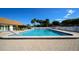 Community pool featuring crystal clear water and a large deck with plenty of seating at 4104 35Th W Ave, Bradenton, FL 34205