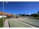 Community shuffleboard courts are meticulously maintained with benches and shade for relaxing at 4104 35Th W Ave, Bradenton, FL 34205
