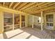 Covered patio offers outdoor shower, access to basement, backyard and shade at 4117 Roberts Point Cir, Sarasota, FL 34242