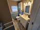 Bathroom featuring a vanity, mirror, and wall decor at 415 Dublin Ave, Bradenton, FL 34207