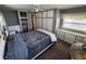 This primary bedroom offers built in storage, closet and a cozy aesthetic at 415 Dublin Ave, Bradenton, FL 34207