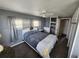 This bedroom features built in storage, closet and a cozy aesthetic at 415 Dublin Ave, Bradenton, FL 34207