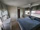 Bright bedroom featuring large windows and natural light at 415 Dublin Ave, Bradenton, FL 34207