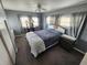 Cozy bedroom featuring neutral colors, natural light, and ceiling fan at 415 Dublin Ave, Bradenton, FL 34207