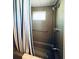 Bathroom featuring shower and tub combo with neutral color scheme at 415 Oakwood E Blvd, Sarasota, FL 34237