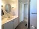 Bathroom includes a sink, vanity, toilet, and closet at 415 Oakwood E Blvd, Sarasota, FL 34237