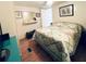Comfortable bedroom features a double bed, closet, and overhead lighting at 415 Oakwood E Blvd, Sarasota, FL 34237