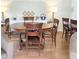 The dining room features a wooden table, chairs, and an eye-catching side board at 415 Oakwood E Blvd, Sarasota, FL 34237