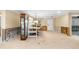 Dining room with built-in display cabinet and open access to other areas at 5073 Higel Ave, Sarasota, FL 34242