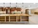 Spacious kitchen with a large island and custom cabinetry that need renovation at 5073 Higel Ave, Sarasota, FL 34242