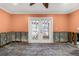 Spacious living room with direct access to outdoor area through double doors at 5073 Higel Ave, Sarasota, FL 34242