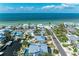 Stunning waterfront home with Gulf views and lush tropical landscaping on Anna Maria Island at 526 Loquat Dr, Anna Maria, FL 34216