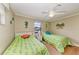 Charming bedroom with two beds, fun nautical decor, and a bright, airy feel at 526 Loquat Dr, Anna Maria, FL 34216