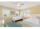 Bright bedroom with twin beds, coastal decor, and a comfortable atmosphere at 527 Magnolia Ave, Anna Maria, FL 34216