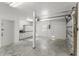 Clean, organized garage with ample storage space and open layout, perfect for parking and projects at 527 Magnolia Ave, Anna Maria, FL 34216